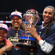 Lisa Leslie, Jamario Moon and the Triplets celebrate with the trophy after defeating the Killer 3s to win the BIG3 Championship in 2019.